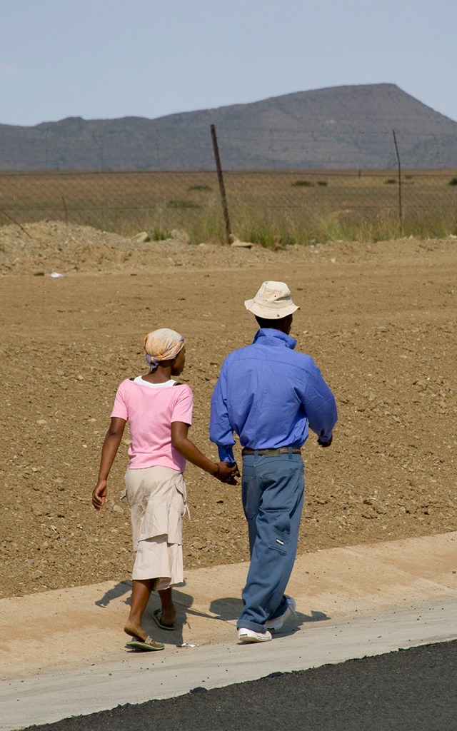 a smart young couple stepping out for a date in the barren Karoo
